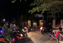 Antisipasi Penyebaran Virus Corona, Anggota Polsek Jaten Himbau Warga Agar Tidak Berkumpul