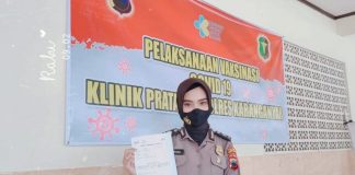 Anggota Humas Polres Karanganyar , Briptu Sufiana Selesai Disuntik Vaksin Covid 19 Pagi ini