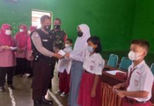 Bhabinkamtibmas Desa Jaten Aiptu Sunarto, Dampingi Penyaluran Penerimaan Dana GNOTA